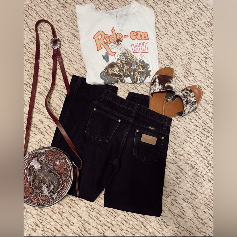 Black cowboy cut wrangler jeans!